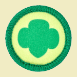 Trefoil Center Piece Fun Patch - a circular yellow patch with a green outline and green trefoil in the center