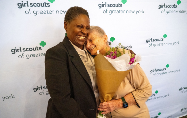 Volunteer receiving flowers